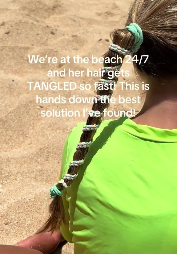 Girl's ponytail with braided cord to prevent tangles.