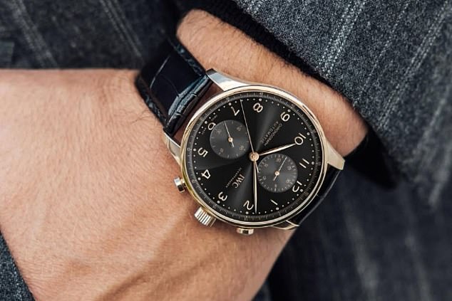 Russell is pictured wearing a Portugieser 'Obsidian' watch, which can cost up to £41,200.