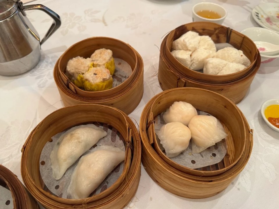 Assortment of dim sum in bamboo steamers.