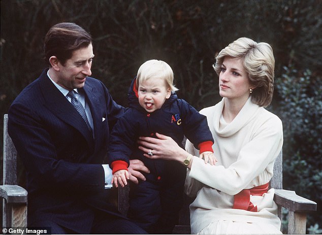Charles and Diana watch William in the gardens of Kensington Palace on December 14, 1983