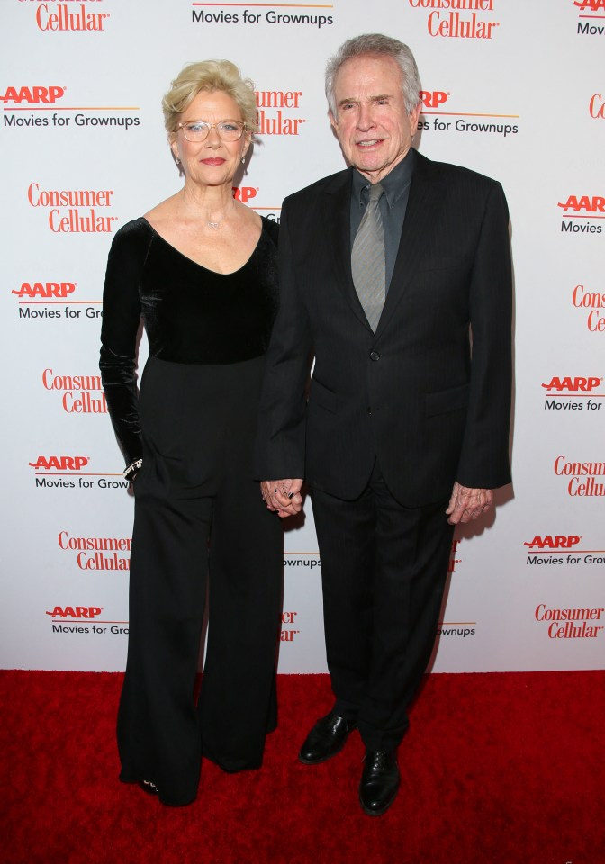 Warren Beatty and Annette Bening at an awards ceremony.