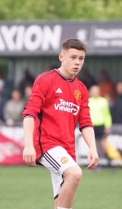 Kai Rooney in Manchester United kit.