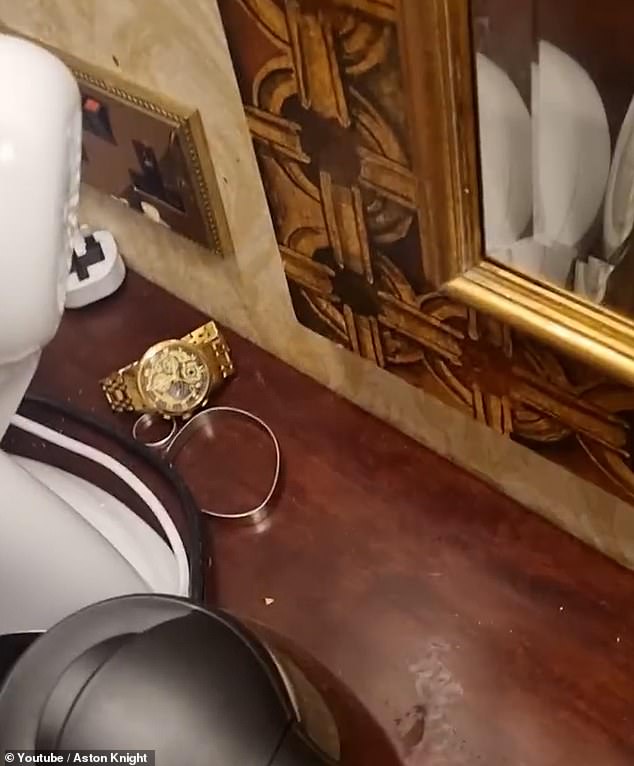 Pictured: A gold watch and jewelry in one of the rooms