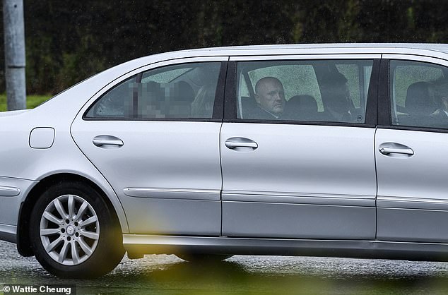 Lyons associate Liam Boyle, 44, (centre) was seen arriving at the gangland funerals in a silver Mercedes limousine