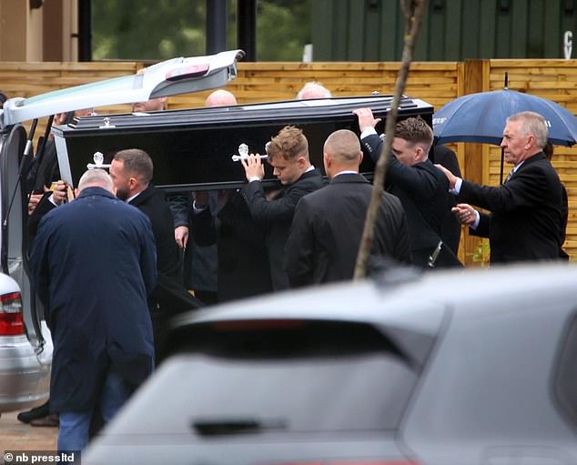 Mourners carried the coffins of the two mobsters into the crematorium to the tune of Braveheart, played by a violinist at the entrance