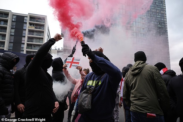The thugs caused a huge bang as they set off smoke bombs and chanted ' Keir Starmer is a w*****'