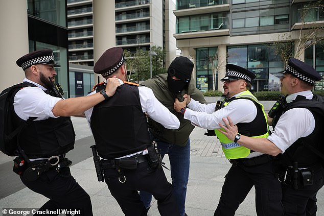 Migrant protestors arrive with flares and clash with police as other anti migrant protesters block the road
