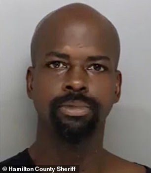 Dominique Kittle, 37, was taken into police custody on Friday night and was charged with felonious assault and aggravated riot