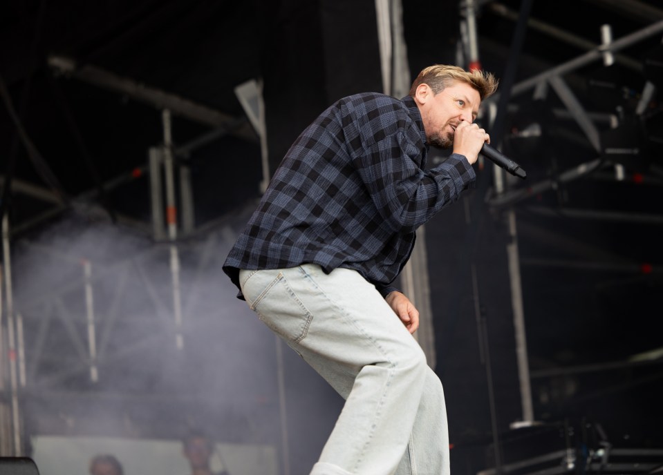 Professor Green performing at a music festival.