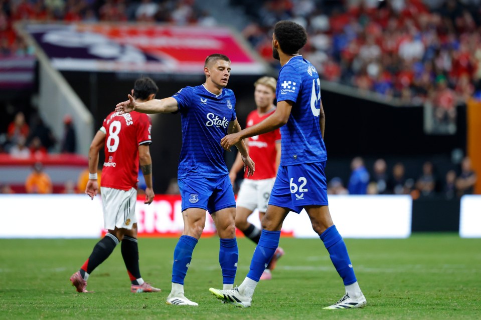 Vitaliy Mykolenko and Tyler Onyango celebrating an Everton goal.