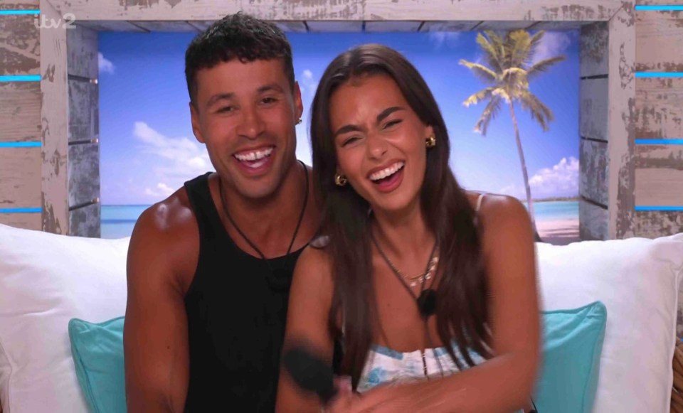Laughing couple on Love Island.
