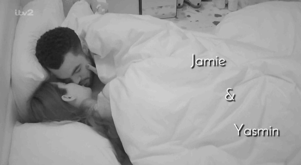 Jamie and Yasmin kissing under covers.
