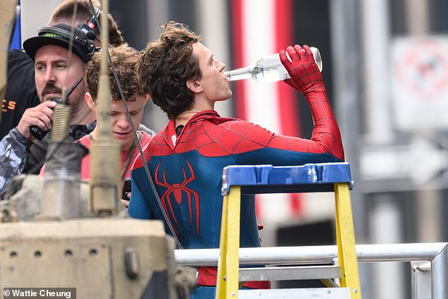 The actor was seen taking a drink of water as he took a brief beak from filming the dramatic-looking scenes