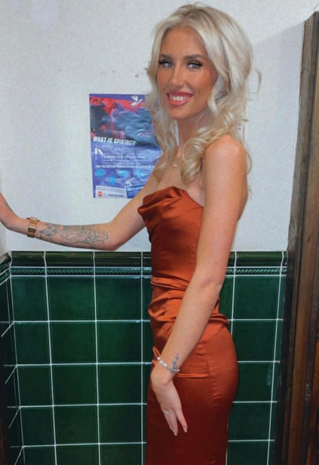 Woman in burnt orange dress.