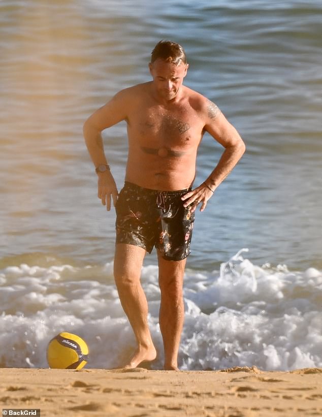 Ant, who already has a number of tattoos, showed off his new ink while taking a dip in the sea