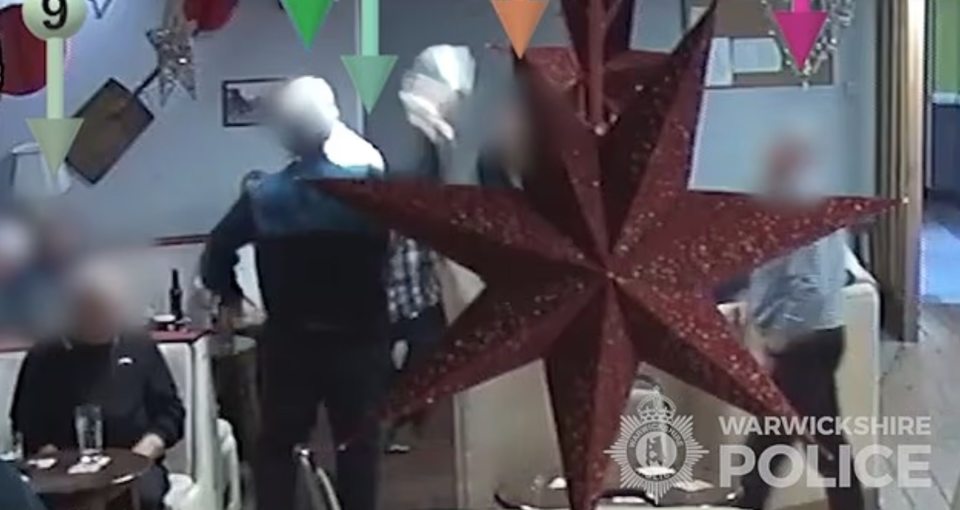 CCTV footage of a man assaulting another man in a pub.