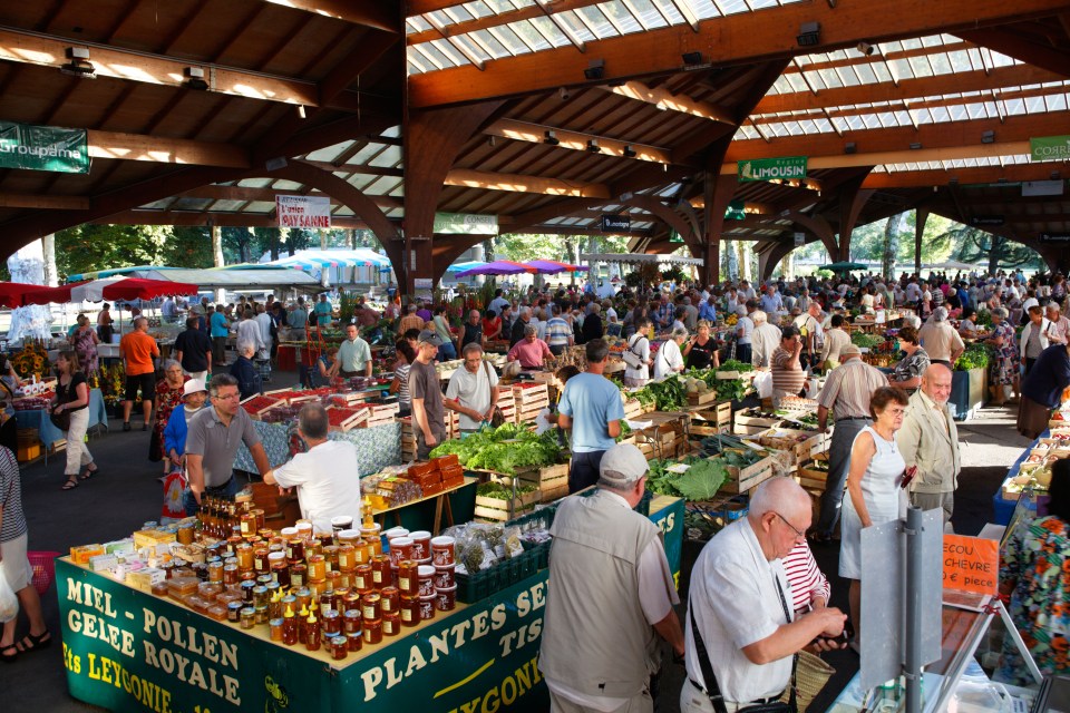 Busy farmers market in Brive la Gaillarde, France.