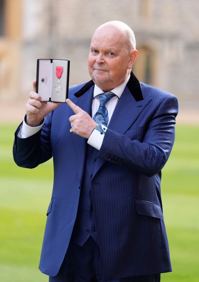 James Whale receives his MBE from the Princess Royal at Windsor Castle.