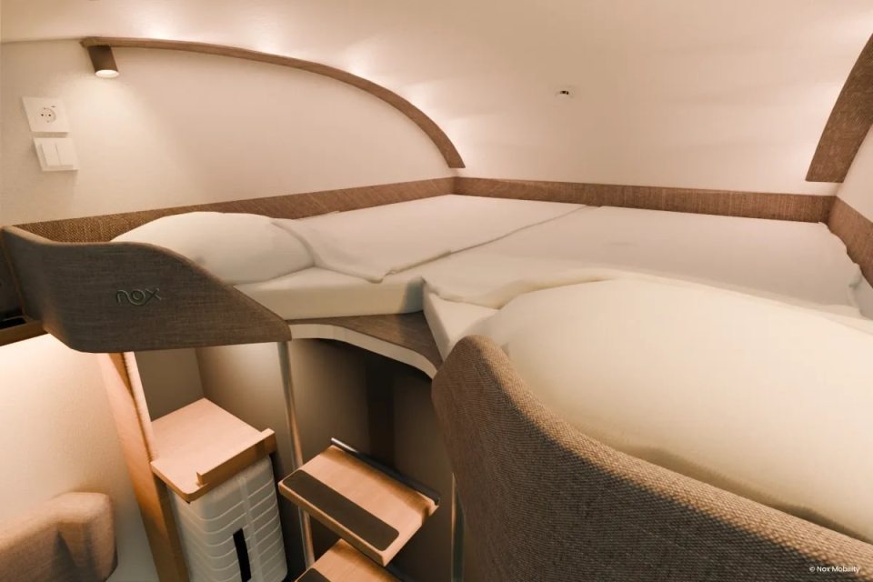 Illustration of a private sleeping compartment on a Nox train.