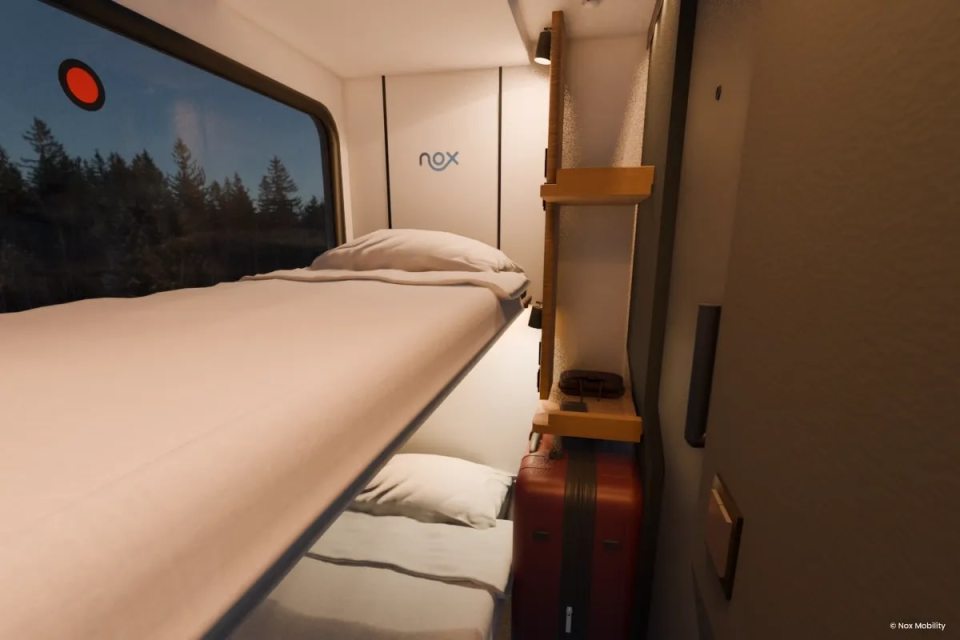 Illustration of a bunk bed in a train cabin.