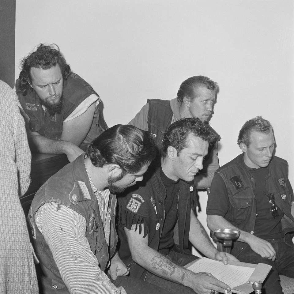 Black and white photo of Ralph "Sonny" Barger, President of the Hells Angels Oakland chapter, at a press conference.
