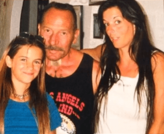 Screengrab of a man and two women.