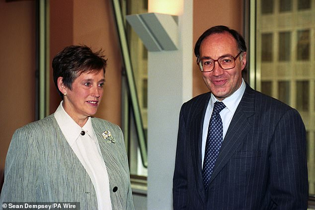 Stella Rimington, the Director-General of Britain's security service MI5 with Home Secretary Michael Howard on July 16, 1993