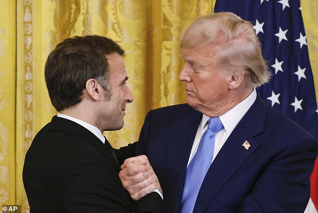 President Donald Trump, right, shakes the hand of France's President Emmanuel Macron during a joint press conference in February