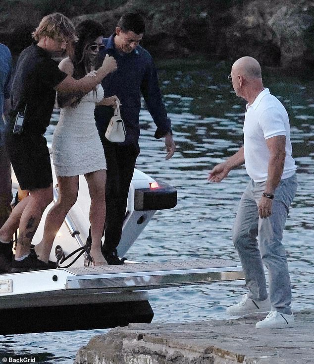 Lauren was helped by other members of staff as she made her way off the boat