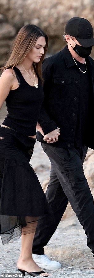 Yet DiCaprio's girlfriend also joined Lauren in her choice of heels as she was seen teetering in a black pair of kitten heels