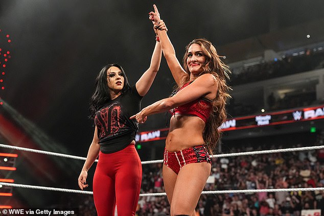 During a live match, a breast implant moved into her ribs (also pictured is Stephanie Vaquer)