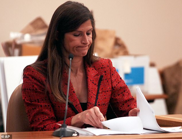 Woods, pictured in May 2009, was placed on leave from the Colorado Bureau of Investigation in October 2023 and resigned the following month. She was charged in January and has not yet entered a plea