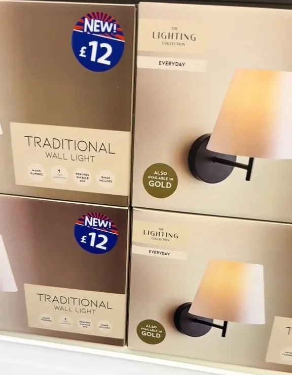 B&M store display of new traditional wall lights for £12.