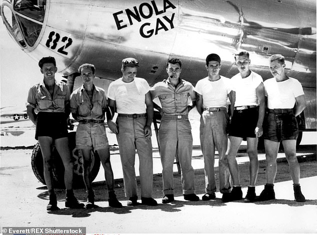 The ground crew of the Enola Gay, which was captained by Colonel Paul W. Tibbets Junior (centre)