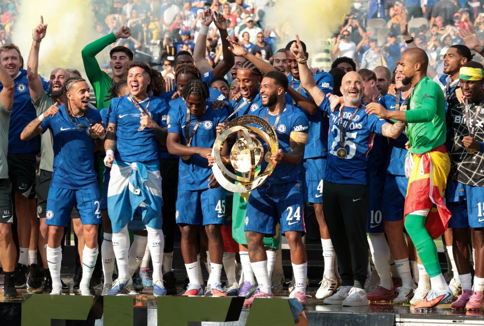 Chelsea FC team celebrating with the FIFA Club World Cup trophy.