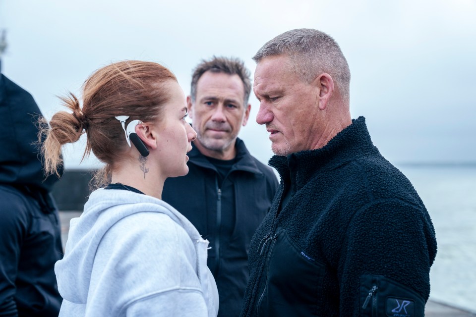 DS Billy and Tasha Ghouri face each other.