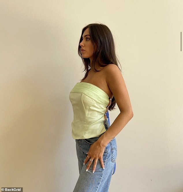 Censori looked nearly unrecognizable as she posed up in a simple top and jeans