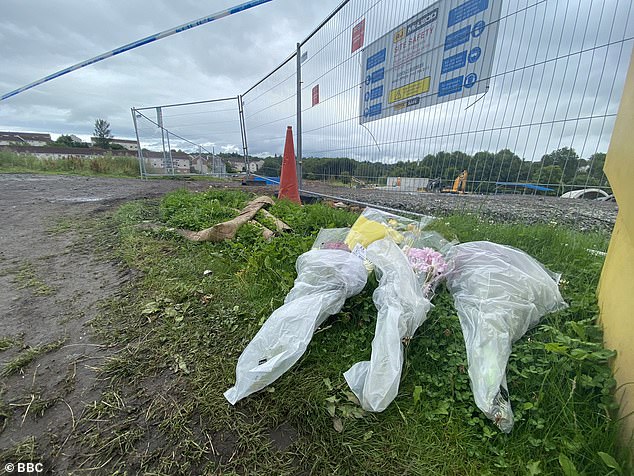 Flowers were laid at the building site Shea died at in the wake of his death
