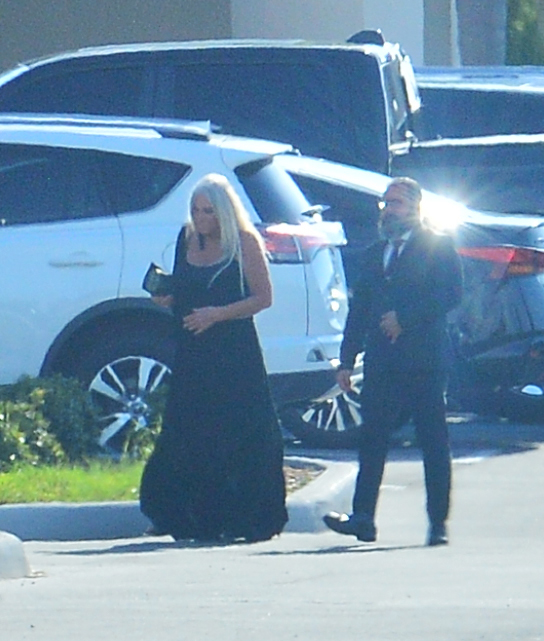 Linda Hogan leaving a memorial service.