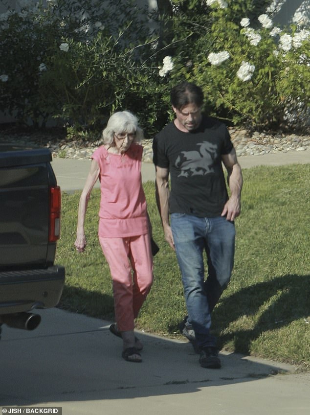 Phypers emerged onto the driveway alongside his mother