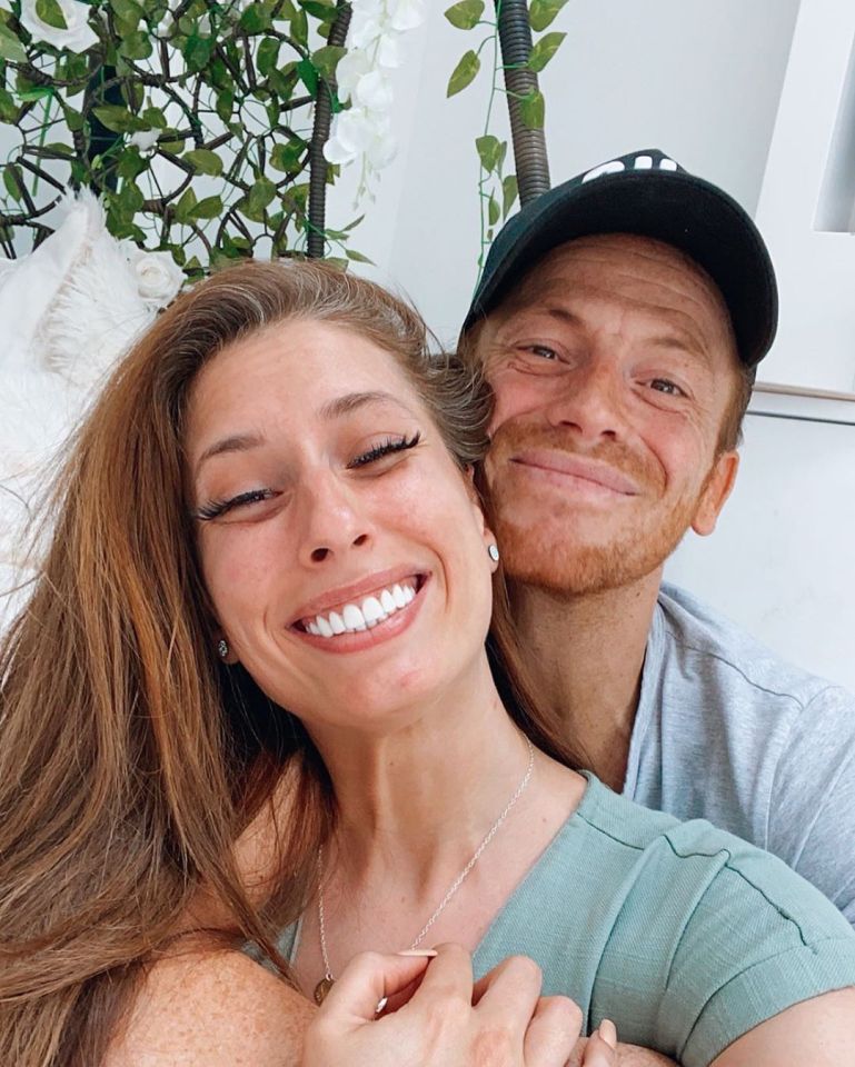 Stacey Solomon and Joe Swash embracing.