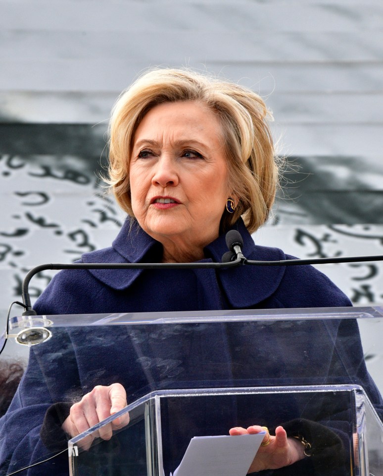 Hillary Rodham Clinton speaking at a podium.