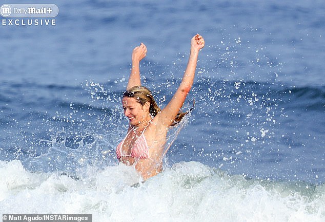 She beamed as she splashed around