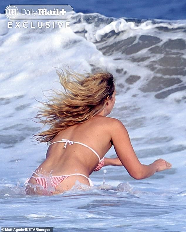 Her blonde tresses looked gorgeous in the summer breeze