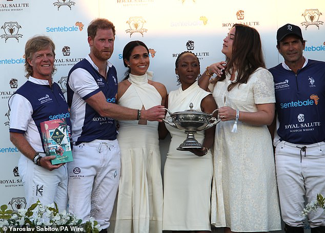 Dr Chandauka, pictured with the Sussexes at the Royal Salute Polo Challenge last April, alleged she was asked to defend Meghan after she was publicly crucified