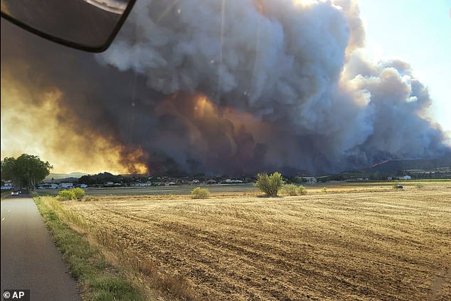 The wildfire in the Corbieres massif, southern France, where one person has died and several others have been injured