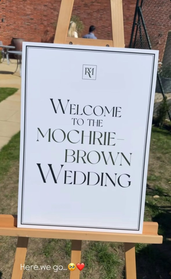 Wedding sign: Welcome to the Mochrie-Brown Wedding.