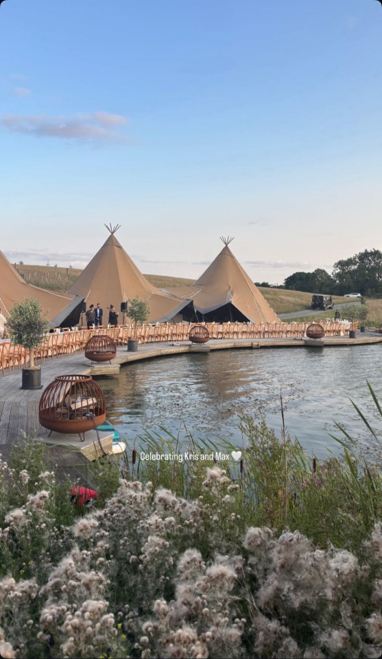 Outdoor wedding reception on a lake.