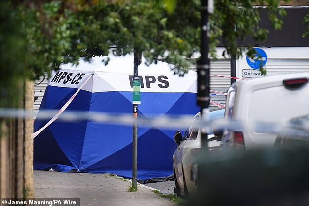 A forensic tent at the scene on Dynevor Road in Stoke Newington as the probe continues