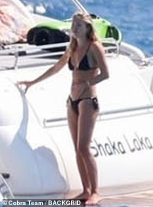 Meanwhile Lila showcased her jaw-dropping figure in the skimpy swimmer while enjoying a trip on a yacht with pals including actress Jaime Winstone , 40